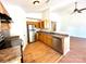 Efficient kitchen layout with stainless steel appliances, and a breakfast bar with an open floorplan at 8551 Appledale Dr, Charlotte, NC 28262