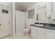 Bathroom features a tub/shower combo, vanity, and bright window at 940 Hatchett Rd, Lincolnton, NC 28092