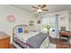 Bedroom featuring hardwood floors, a ceiling fan, natural light, and neutral walls at 940 Hatchett Rd, Lincolnton, NC 28092