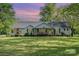 Charming single-story home with a well-manicured lawn and inviting curb appeal at 940 Hatchett Rd, Lincolnton, NC 28092