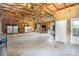 Spacious garage with high ceilings, offering ample room for parking, storage, or hobbies at 940 Hatchett Rd, Lincolnton, NC 28092