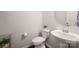 Powder room features a modern sink, toilet, and vanity at 9613 Fire Bellied Ct, Lancaster, SC 29720