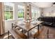 Spacious dining area is filled with natural light and features hardwood floors at 9613 Fire Bellied Ct, Lancaster, SC 29720