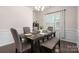 Dining room featuring a large table with seating for six at 9613 Fire Bellied Ct, Lancaster, SC 29720