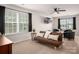 Cozy living room with ample natural light, comfortable seating and modern decor at 9613 Fire Bellied Ct, Lancaster, SC 29720