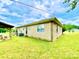 Home exterior with a picnic table beneath a wooden gazebo, a lawn, and shed at 970 Mt Moriah Church Rd, China Grove, NC 28023