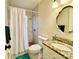 Well-lit bathroom featuring a shower, toilet, and vanity with granite countertop at 970 Mt Moriah Church Rd, China Grove, NC 28023