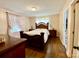 Bedroom featuring hardwood floors, natural light, and ensuite bathroom at 970 Mt Moriah Church Rd, China Grove, NC 28023