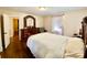 Spacious bedroom featuring hardwood floors, natural light, and ensuite bathroom at 970 Mt Moriah Church Rd, China Grove, NC 28023
