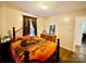 Comfortable bedroom with hardwood floors and a dresser with a large mirror at 970 Mt Moriah Church Rd, China Grove, NC 28023