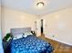 Light-filled bedroom with hardwood flooring, a bed, and a serene ambiance at 970 Mt Moriah Church Rd, China Grove, NC 28023