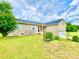 Brick home featuring a well-maintained lawn and landscaping, complemented by a blue sky backdrop at 970 Mt Moriah Church Rd, China Grove, NC 28023