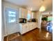 Charming kitchen features granite countertops and white cabinets, filled with natural light at 970 Mt Moriah Church Rd, China Grove, NC 28023