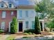 Charming townhome with well-maintained landscaping and a welcoming entrance at 9832 Longstone Ln, Charlotte, NC 28277