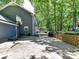 Spacious backyard with a basketball hoop and direct access to the outdoor deck area at 10024 Whitethorn Dr, Charlotte, NC 28277