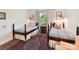 Inviting bedroom with twin beds, classic decor, and a cozy atmosphere at 10024 Whitethorn Dr, Charlotte, NC 28277