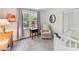 Charming Bedroom with patterned rug, glider, and a bright window view at 10024 Whitethorn Dr, Charlotte, NC 28277