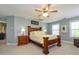 Spacious bedroom with ceiling fan, carpet, and windows with blinds at 10944 Persimmon Creek Dr, Mint Hill, NC 28227