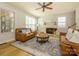 Inviting living room with hardwood floors, gas fireplace, and lots of natural light at 10944 Persimmon Creek Dr, Mint Hill, NC 28227