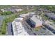 Aerial view of a shopping center and parking lot at 11329 Corliss Ave, Charlotte, NC 28277