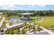 Aerial view of outdoor amphitheater with pond and park at 11329 Corliss Ave, Charlotte, NC 28277