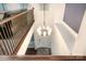 Staircase that views the front door with natural lighting and a hanging chandelier at 11329 Corliss Ave, Charlotte, NC 28277