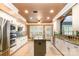 Spacious kitchen with stainless appliances, granite counters, and an island at 11329 Corliss Ave, Charlotte, NC 28277