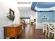 Open-concept living area with hardwood floors, fireplace, and elegant decor at 11329 Corliss Ave, Charlotte, NC 28277