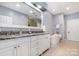 Elegant main bathroom with a soaking tub, marble countertops, and a large mirror at 11329 Corliss Ave, Charlotte, NC 28277