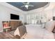 Bright main bedroom with shutters, ceiling fan, hardwood floors and neutral decor at 11329 Corliss Ave, Charlotte, NC 28277