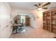 Office space with built-in bookshelves, desk, and a window at 11329 Corliss Ave, Charlotte, NC 28277