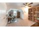 Office space with built-in bookshelves, desk, and a window at 11329 Corliss Ave, Charlotte, NC 28277