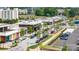 Shopping center with street parking and storefronts at 11329 Corliss Ave, Charlotte, NC 28277
