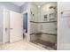 Modern shower with glass enclosure, and built-in shower niche at 11329 Corliss Ave, Charlotte, NC 28277