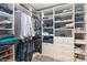 Spacious walk-in closet with custom shelving and ample storage space at 11329 Corliss Ave, Charlotte, NC 28277