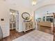Welcoming foyer leading to a half bathroom and a spacious living area at 11727 Dunham Dr, Matthews, NC 28105