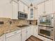Beautiful kitchen with stainless steel appliances, granite countertops, and custom cabinets at 11727 Dunham Dr, Matthews, NC 28105
