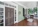 Inviting front porch with comfortable seating, perfect for relaxing and enjoying the outdoors at 128 Spears Creek Dr, Mooresville, NC 28117