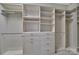 Walk-in closet featuring custom shelving and drawers for maximum storage capacity at 128 Spears Creek Dr, Mooresville, NC 28117