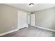 Bedroom with neutral walls, hardwood floors, and a closet at 131 Little Forest Ln, Statesville, NC 28625