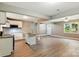 Well-lit kitchen featuring modern appliances, granite countertops, and a functional island at 131 Little Forest Ln, Statesville, NC 28625