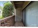 Outdoor balcony with privacy and view of nearby landscaping at 1608 Sharon W Rd # 55, Charlotte, NC 28210