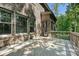 Back deck featuring brick elevation and access to the yard at 1614 Tarrington Way, Indian Trail, NC 28079
