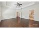 Large bedroom featuring hardwood floors, recessed lights, and neutral walls at 1614 Tarrington Way, Indian Trail, NC 28079