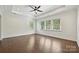 Spacious bedroom with hardwood floors, recessed lights, and tray ceiling at 1614 Tarrington Way, Indian Trail, NC 28079