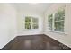 Bright office space with hardwood floors, natural light, and white trim throughout at 1614 Tarrington Way, Indian Trail, NC 28079