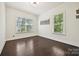 Room with hardwood floors, two windows, and natural light at 1614 Tarrington Way, Indian Trail, NC 28079