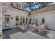 Backyard with large deck and outdoor dining and seating area perfect for entertaining at 17924 River Ford Dr, Davidson, NC 28036