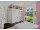 Bright bedroom with vaulted ceiling, large window, built in bookshelf, and stylish decor at 17924 River Ford Dr, Davidson, NC 28036
