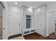 Welcoming mudroom with custom built-in cabinets, bench seating, and ample storage at 17924 River Ford Dr, Davidson, NC 28036